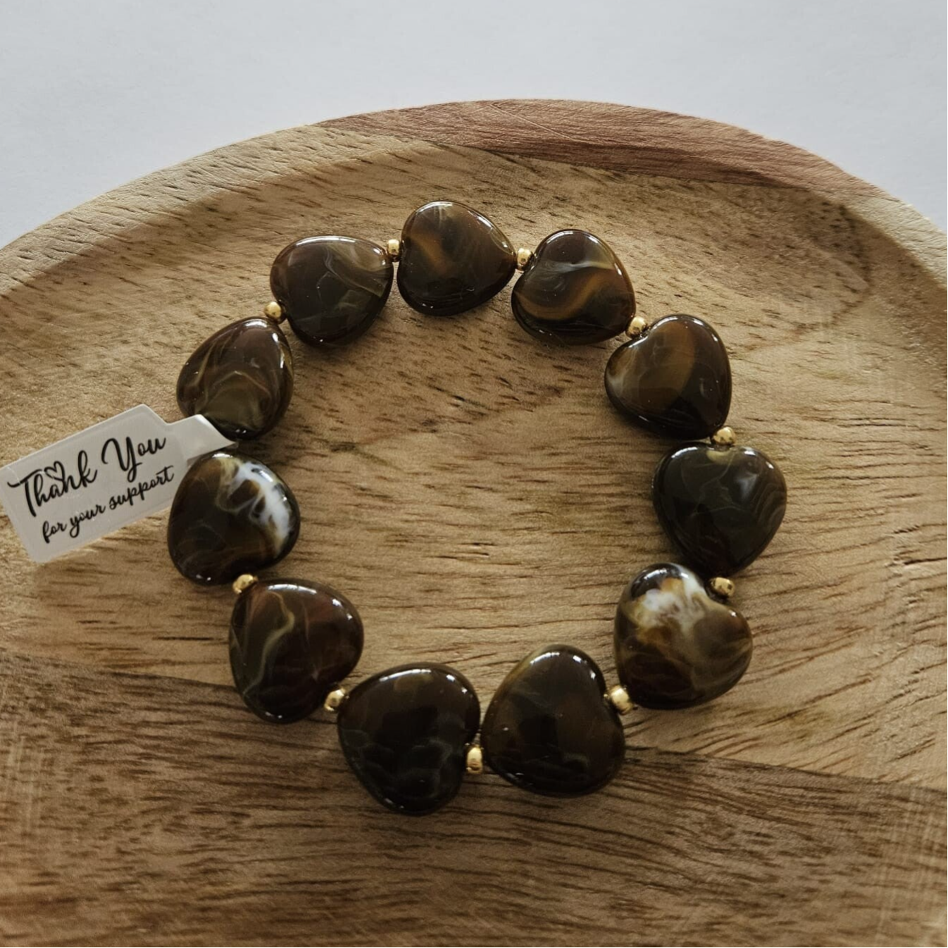 Armband bruin - hartjes met goud