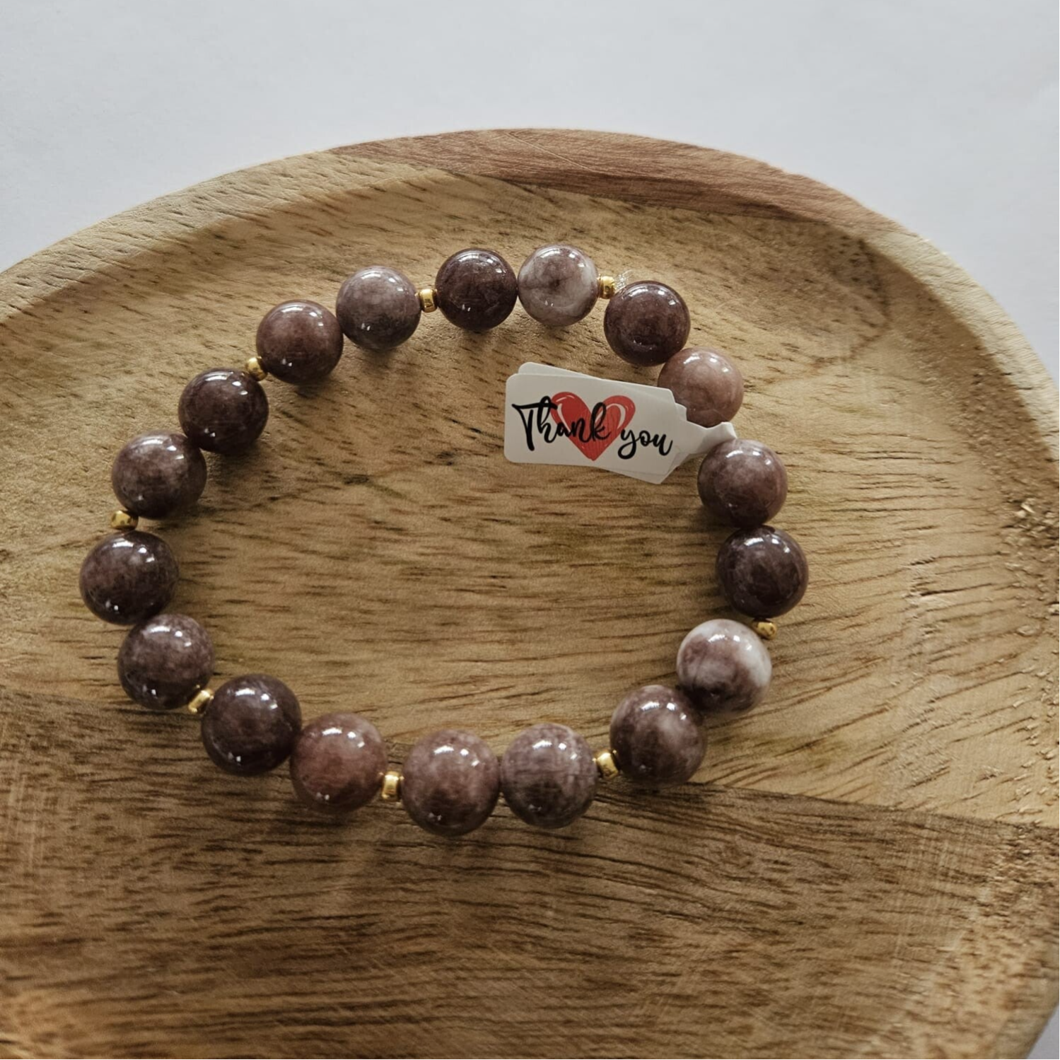 Armband bruin - ronde kraal met goud