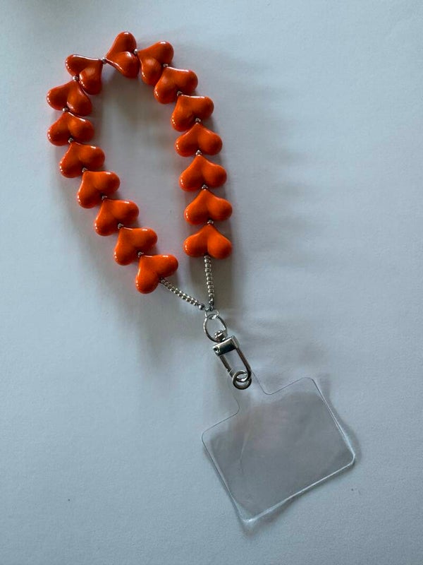 Kralen strap hartjes oranje