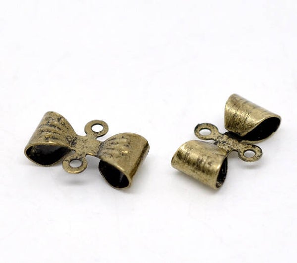 Lot de 10 breloques connecteurs nœud papillon couleur bronze