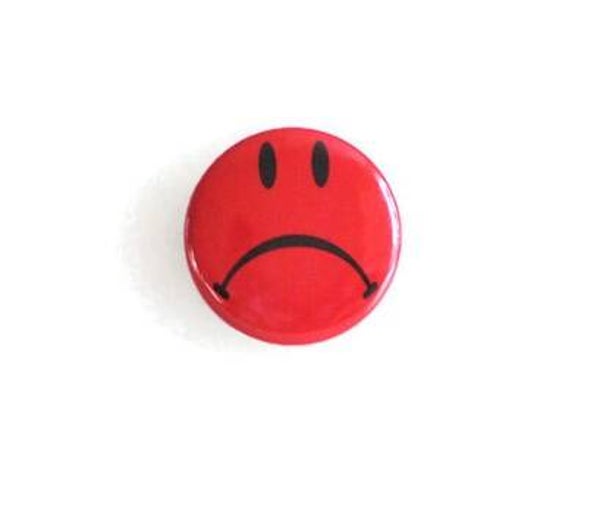 badge "smiley rouge"