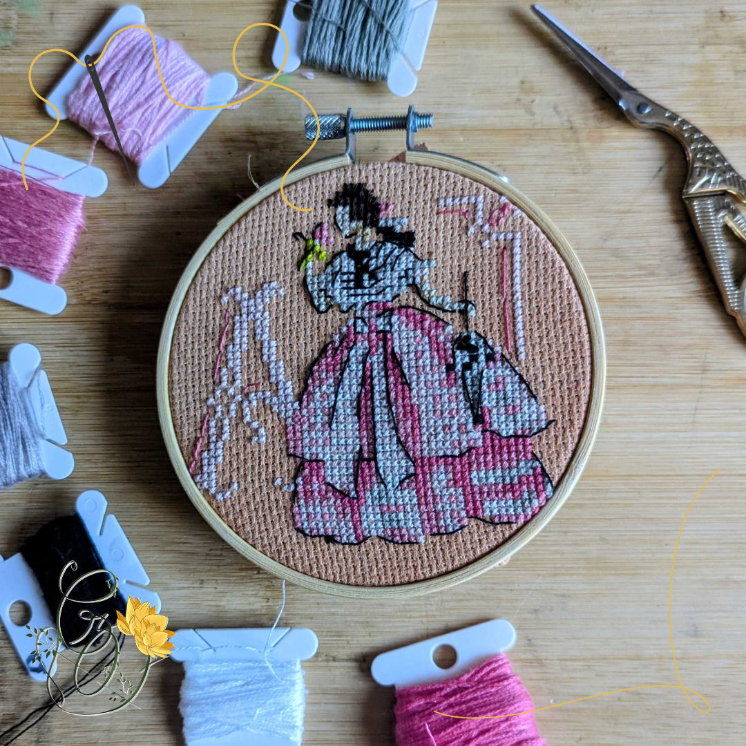 Broderie artisanale – Lettre A & femme en robe crinoline