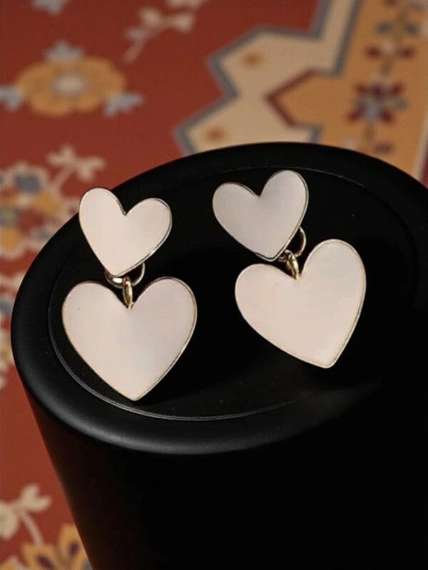 Boucles d’oreilles cœurs blancs pendants 🤍✨