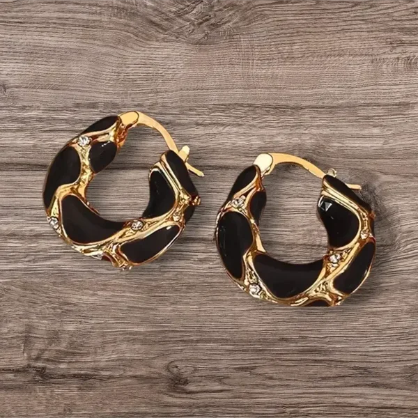 Créoles dorées et noires à strass ✨