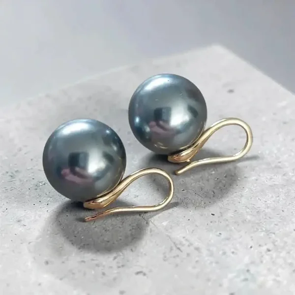 Boucles d’oreilles perle noire dorée – élégance chic et éclat raffiné