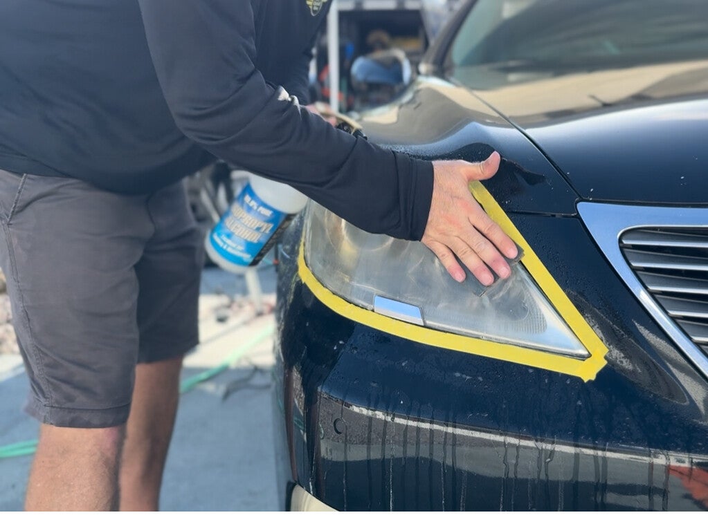 Headlight restoration sanding by My Detail guy Bradenton, FL