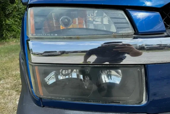 Blue Silverado clear headlight lenses restored by My Detail guy