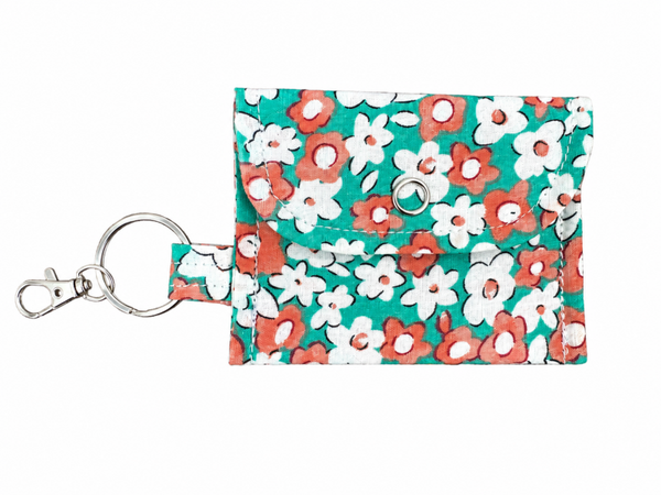 Porte clé pochette écouteur sans fil Claudia