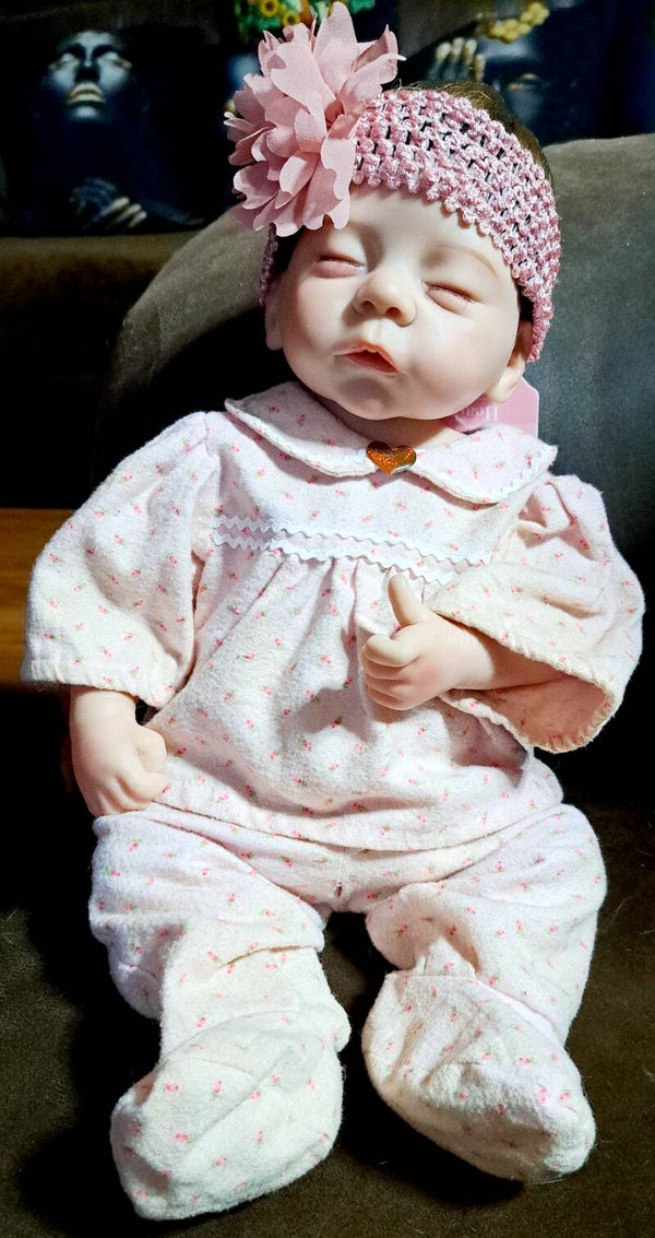 Soft vynle baby girl doll. (Anatomically correct)