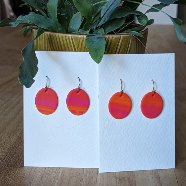 Samia gemarmerd oranje hanger