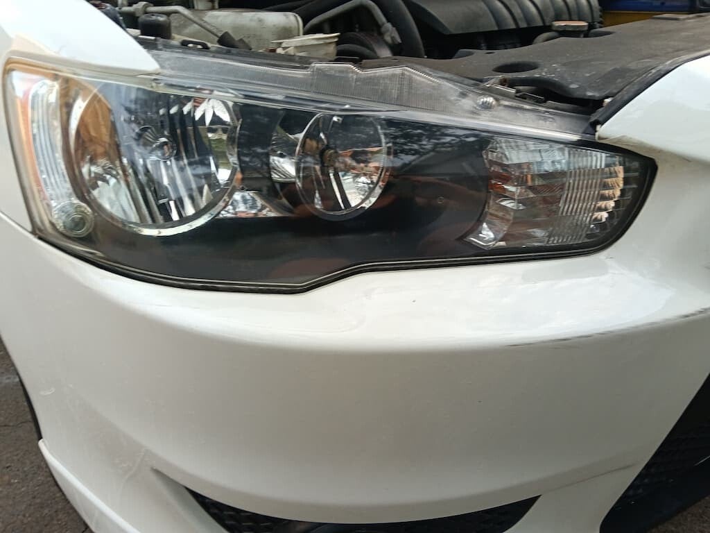 Headlight Restoration - masked up headlights just completed 