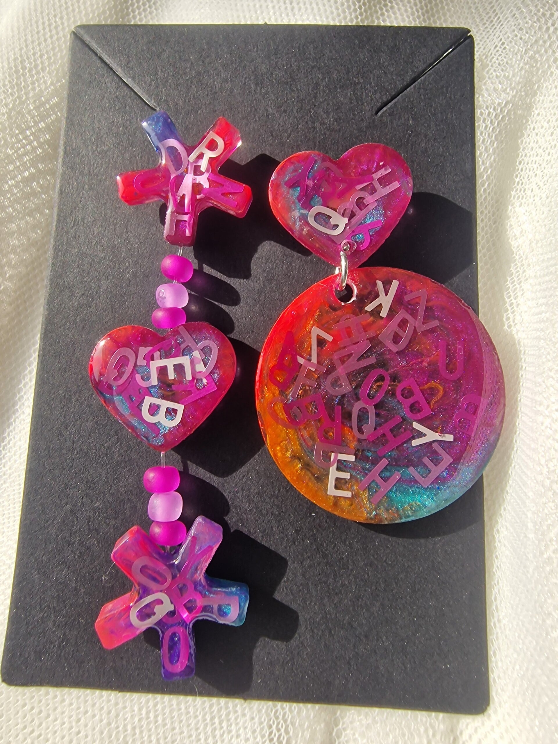 Boucle d'oreille abc