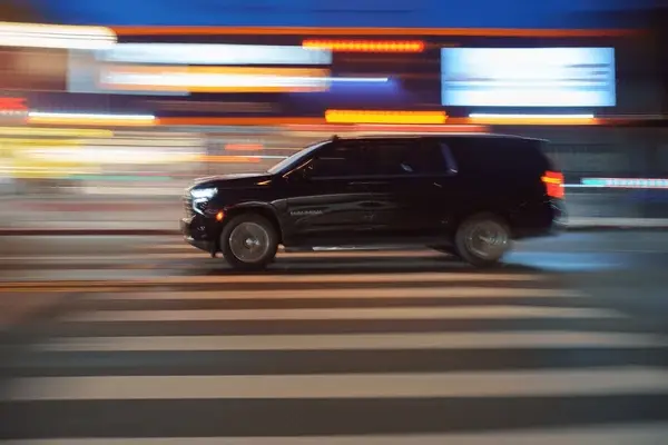 stock image if black suv in motion
