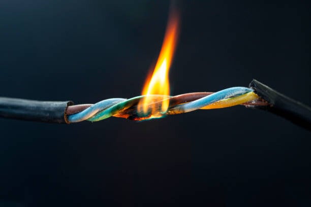 A copper wire on fire 