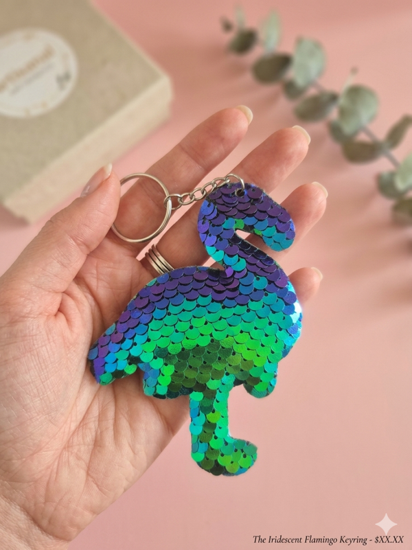 Porte clef flament sequins vert/violet