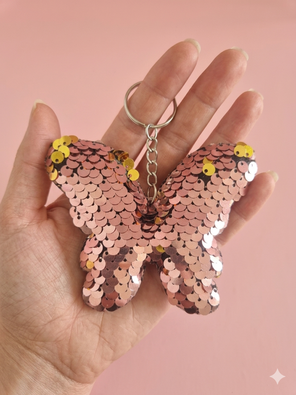 Porte clef sequins papillon rose
