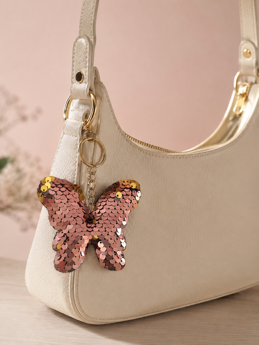 Porte clef sequins papillon rose