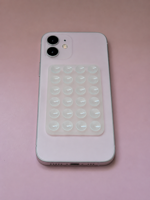 Support telephone a ventouse transparent