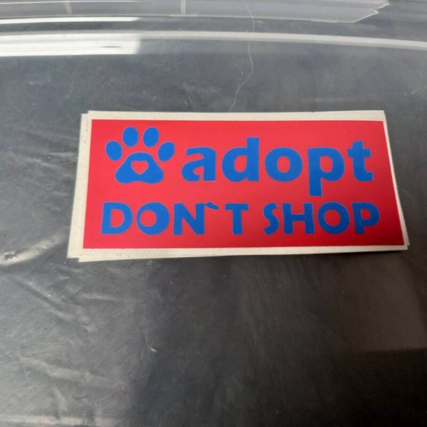 Adopt don't shop kleur oranje en blauw