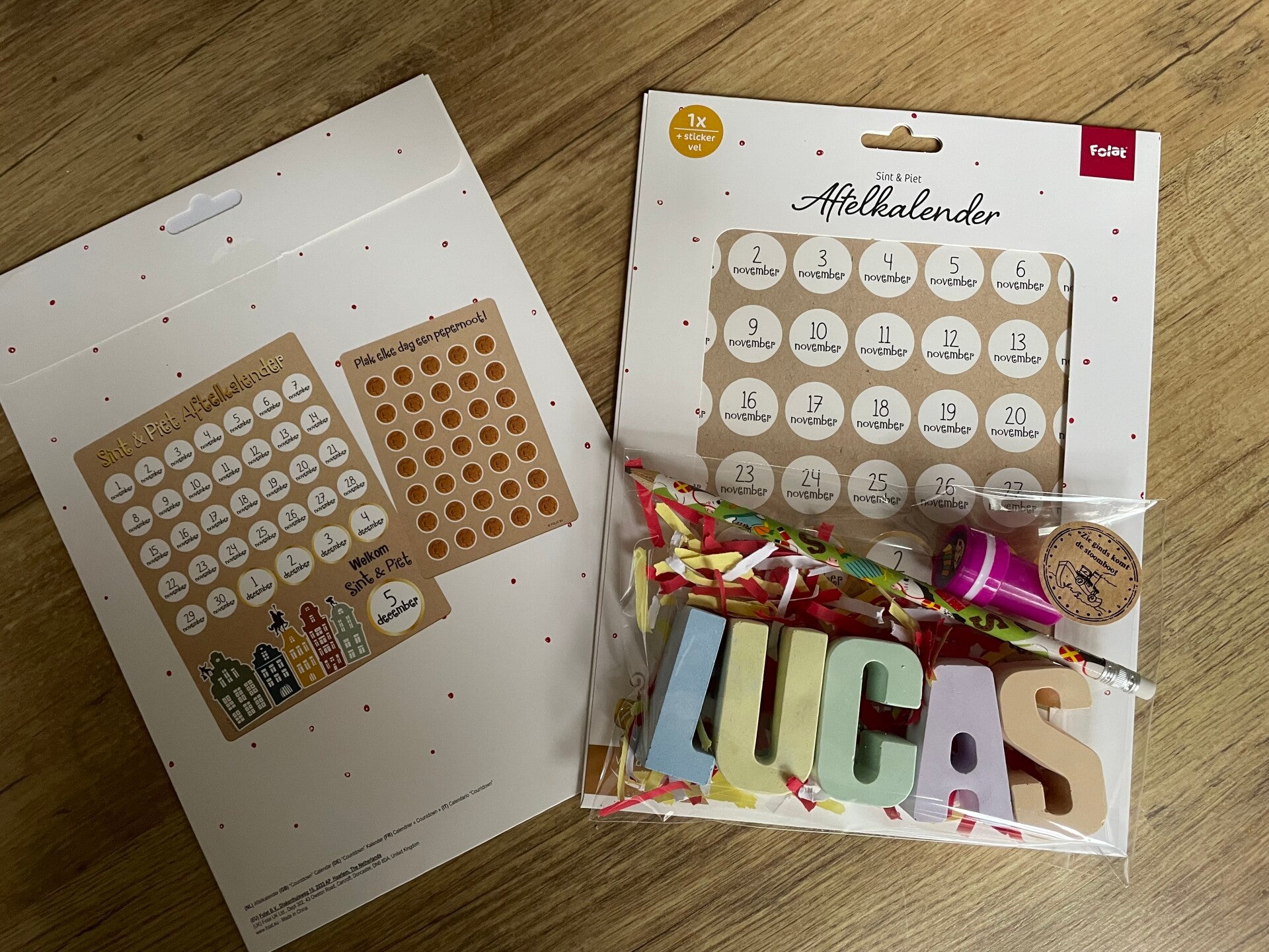 Aftelkalender met naam van stoepkrijt
