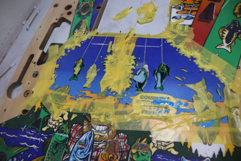 Williams Fish Tales playfield speelveld schade herstel restoration flipperspeelveld restauratie art airbrush airbrushing flipperkast reparatie