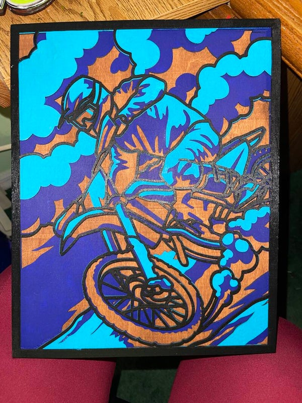 Dirt bike rider wood art