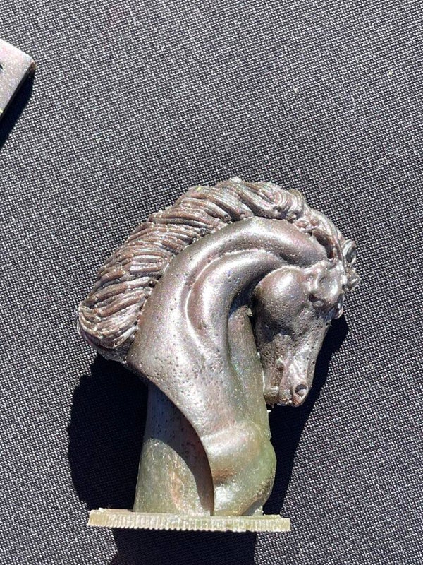 Horse head figurine