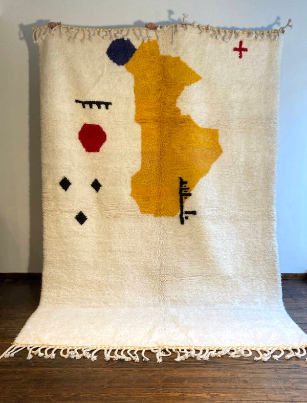 Wool Moroccan rug with abstract drawing