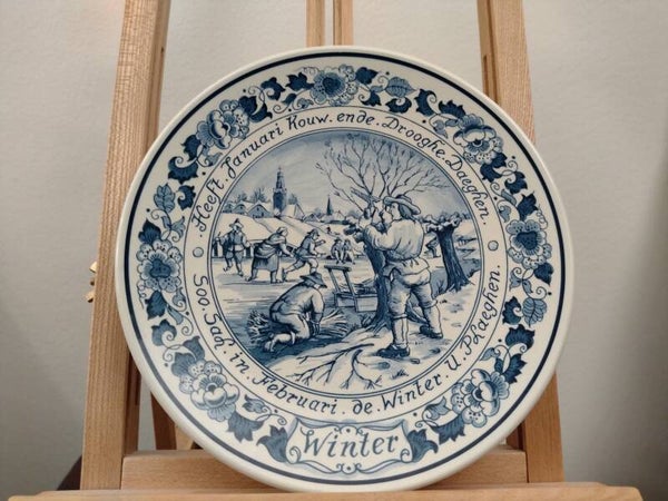 Vintage Delfts blauw wandbord Winter Ø24,5 cm – handgeschilderd Hollands wintertafereel