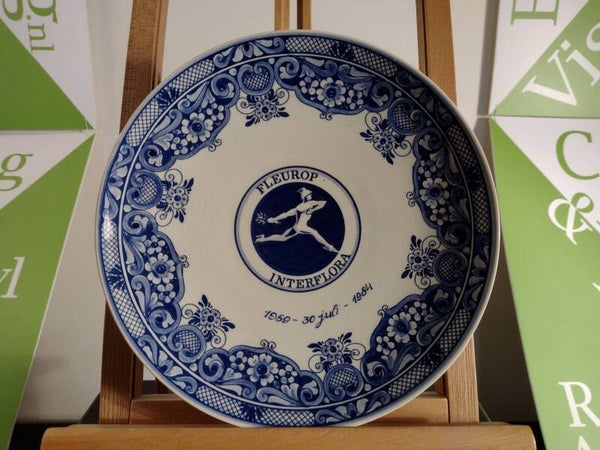 Vintage Delfts blauw Fleurop Interflora jubileumbord 1959–1984 Ø25 cm – Holland