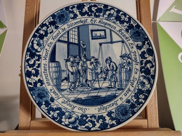Vintage Delfts blauw wandbord historisch tabakshandel tafereel Ø24 cm – Handwerk