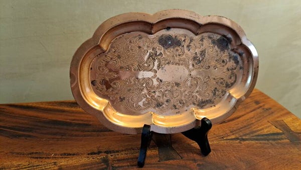 Vintage koperen schaal met rijk gegraveerd ornament – 25 × 15 cm