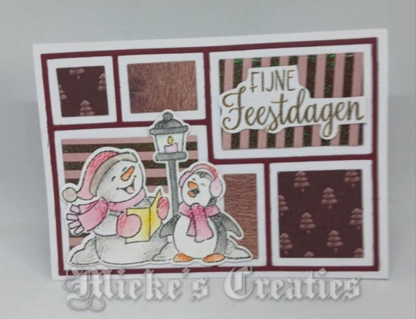 zingende sneeuwpop met pinquin fijne feestdagen