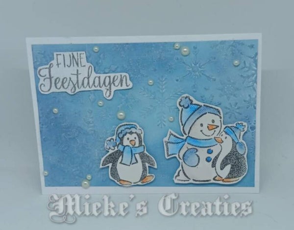 sneeuwpop met pinquin's fijne feestdagen