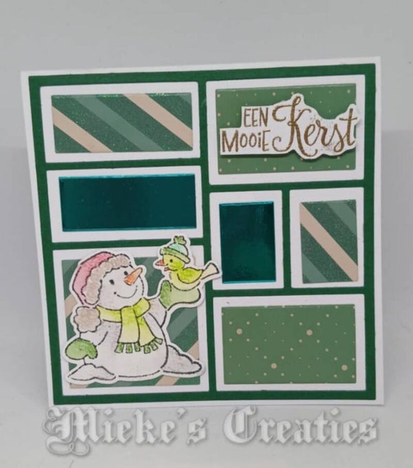 sneeuwpop met vogeltje een mooie kerst