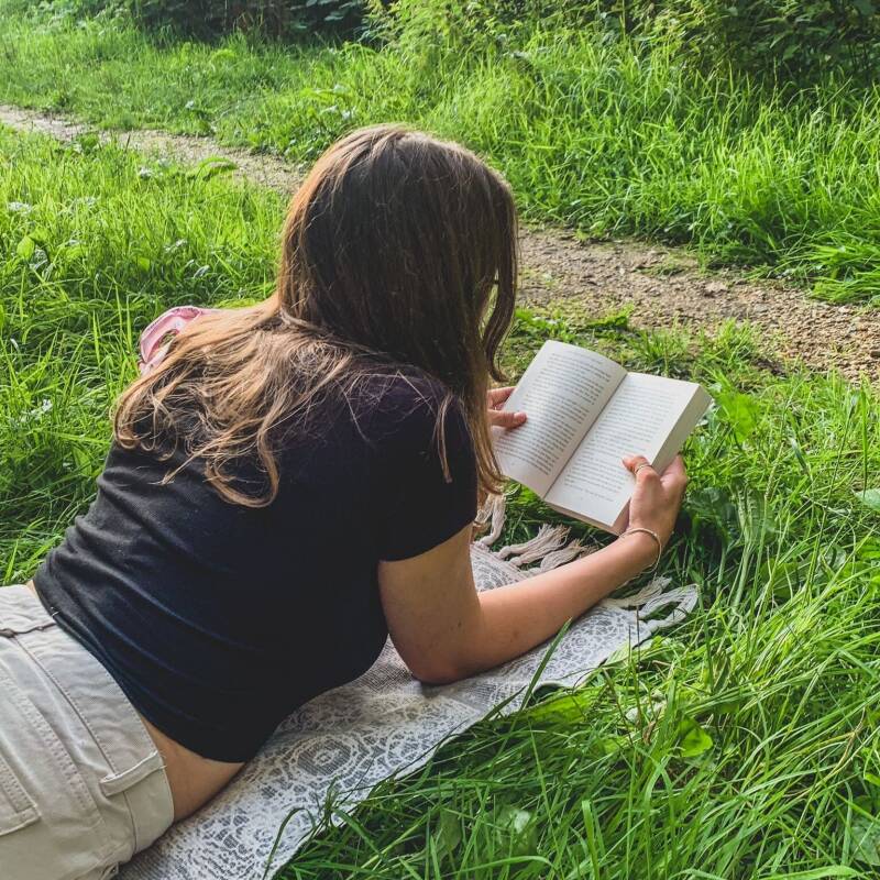 This image contains Girl reading book