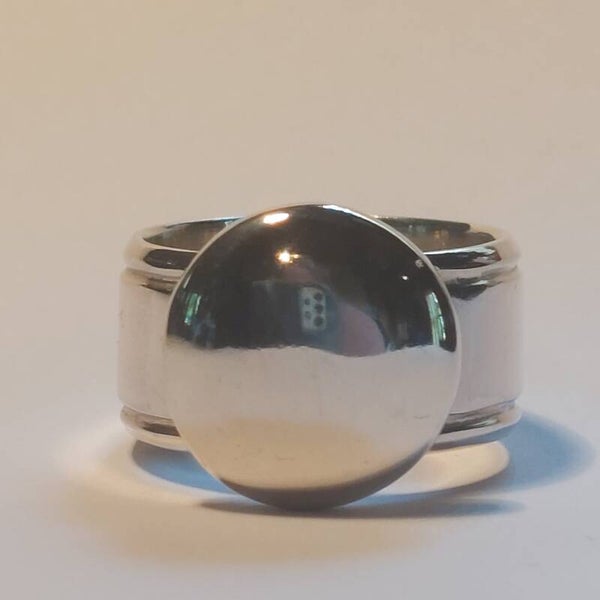 Zilveren ring.