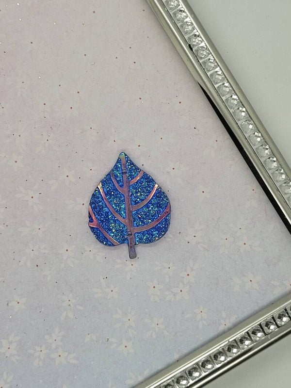 Glitterblaadje blauw