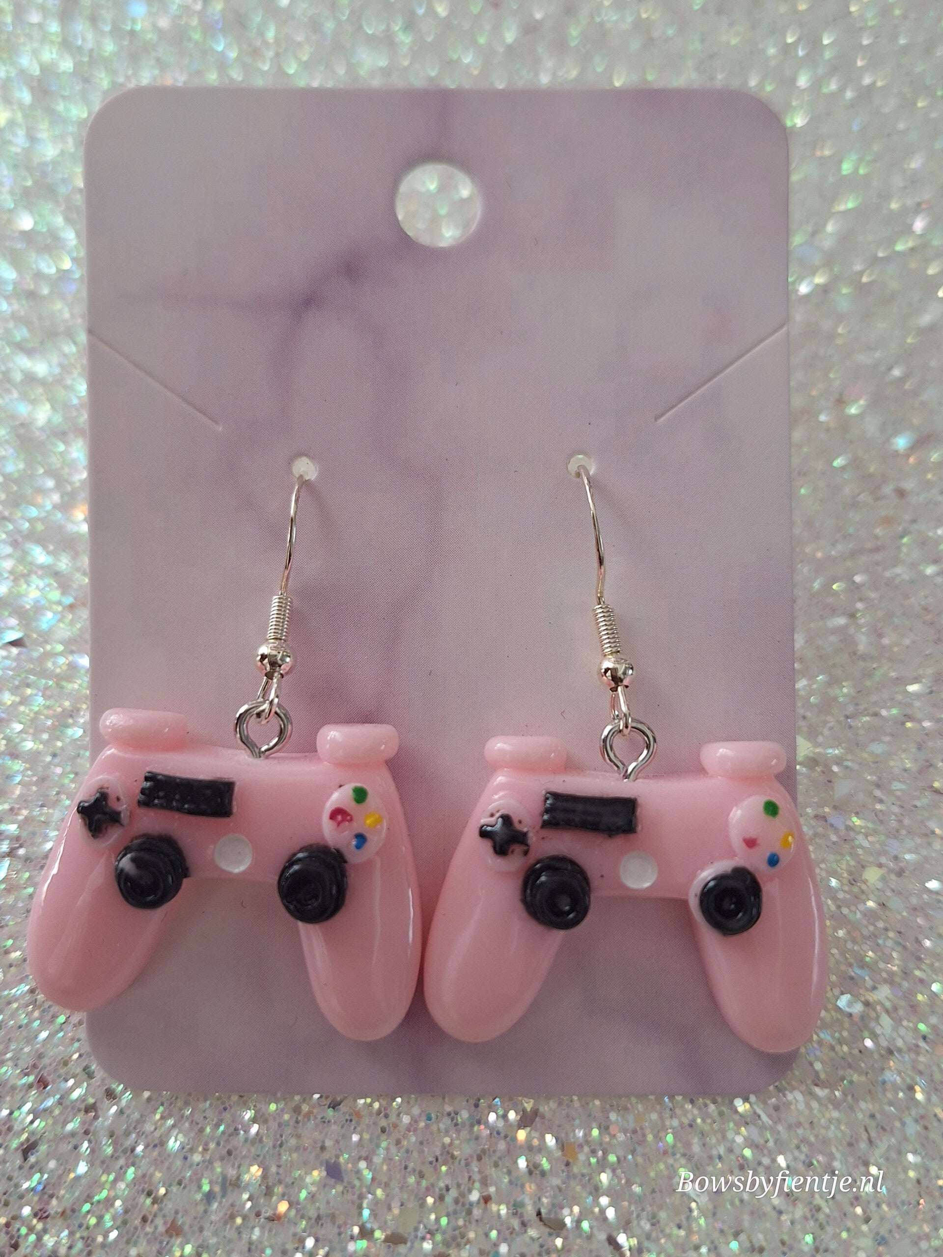 Oorbelletjes controller roze