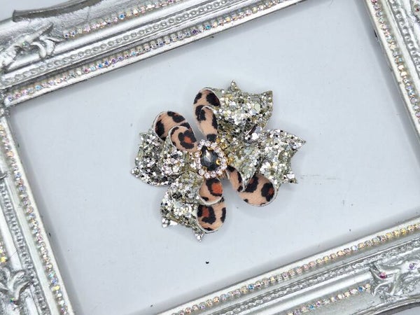Haarstrik panterprint meet gouden glitters