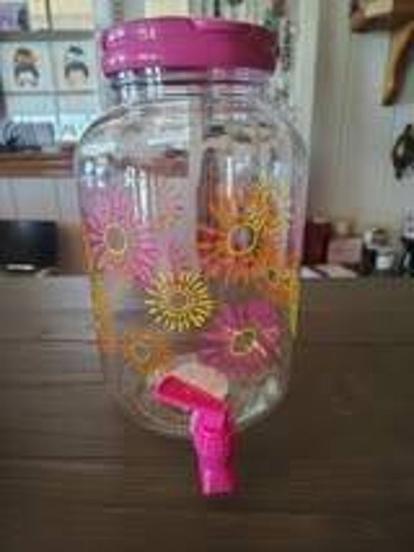 Mainstays plastic 1-gallon cold drink dispenser with a sunburst pattern