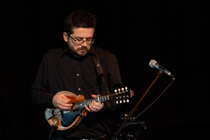 André  gemandolineerd