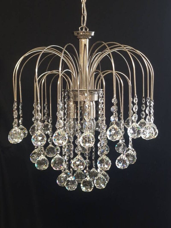 Chandelier: The Shiny Diamond, Made with the high quality Crystals of Asfour ( 32%Pbo ) Renovated frame
