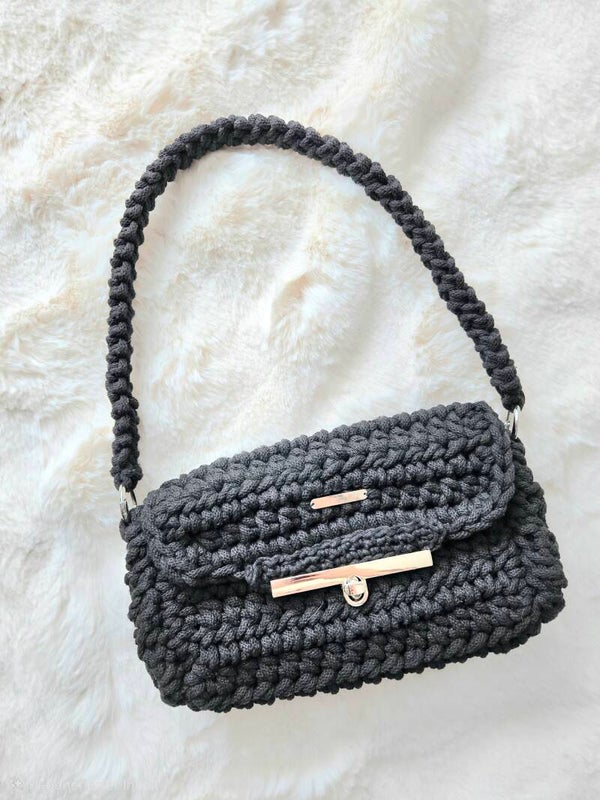 ENY NOIR – elegante schwarze Abendtasche mit silbernem Drehverschluss