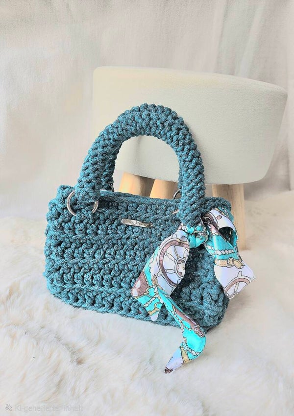 MIDI NOELLE – elegante Tasche in Türkis mit silbernen Lurexfäden