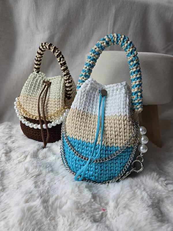 AZIRA BLUE – elegante Bucket Bag mit kunstvollem Design