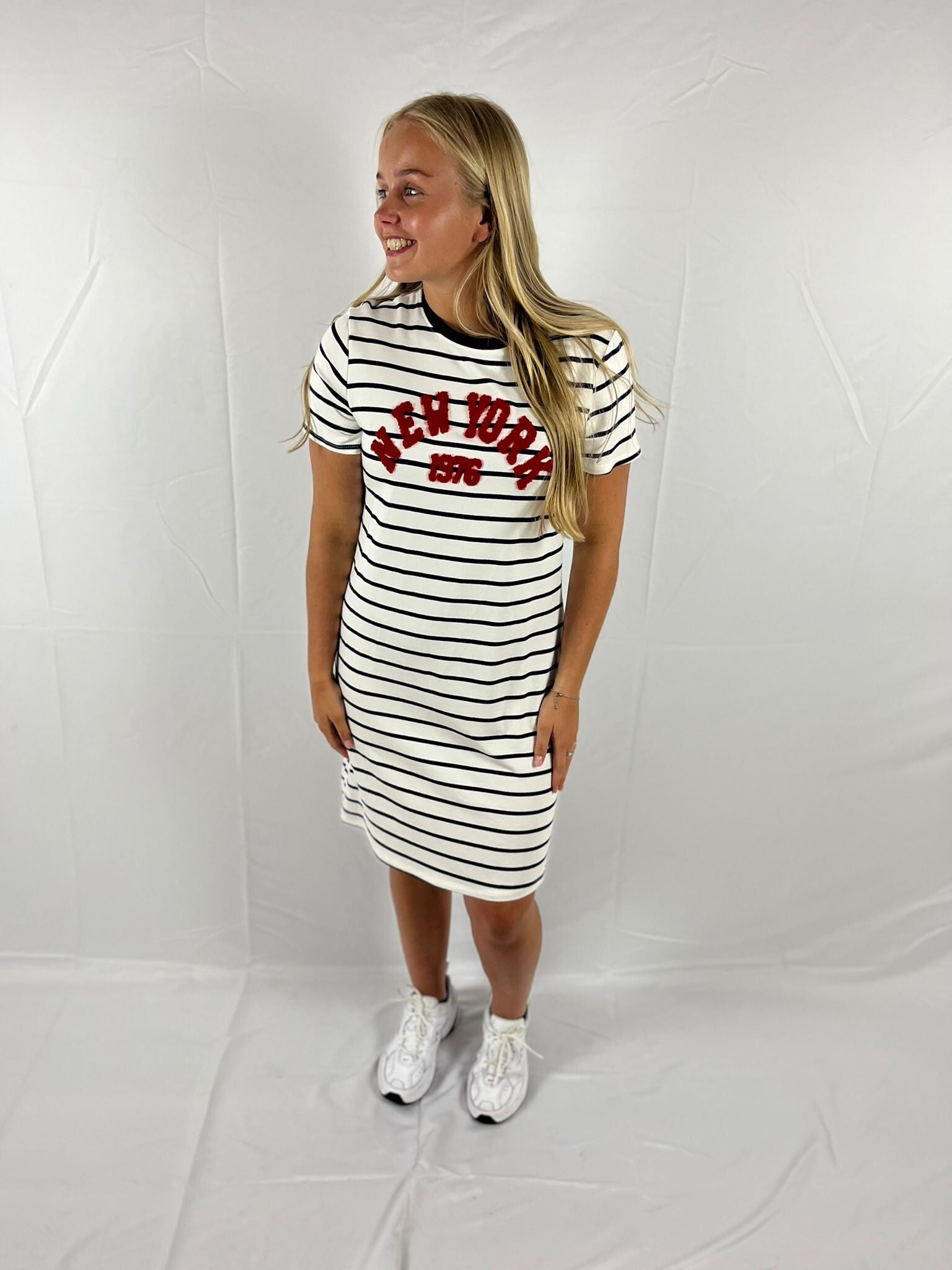 Gestreepte strandjurk oranje