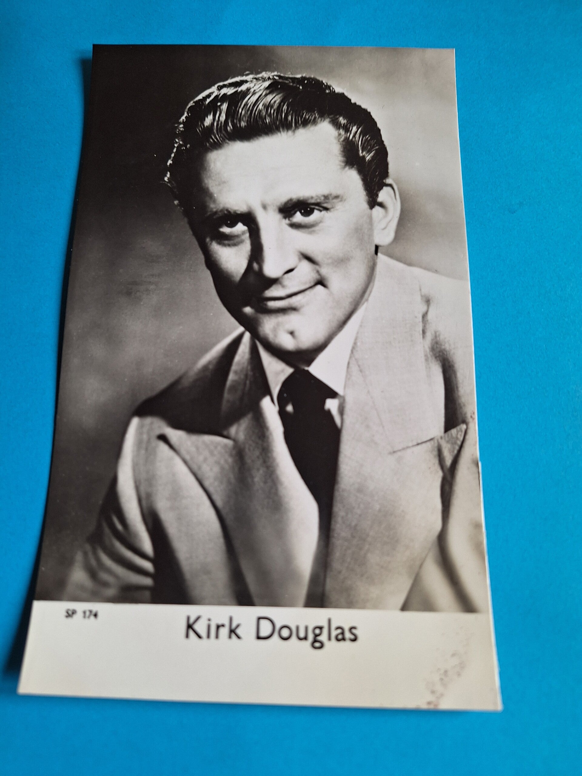 KIRK DOUGLAS REAL GLOSSY PHOTO CARD 1950s 1960s SIZE APPROX  13CM X 19CM FROM TILLEYS OF SHEFFIELD