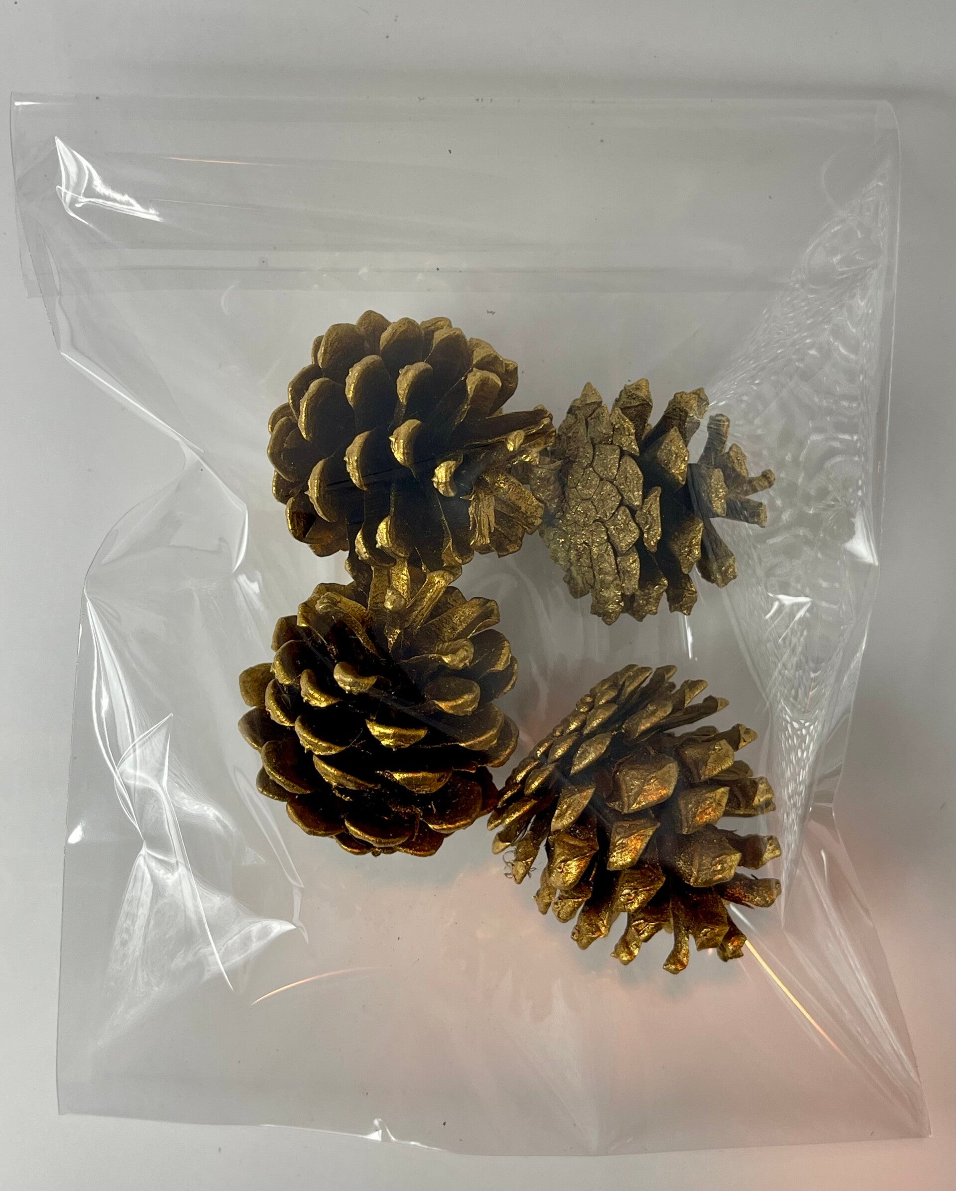 Knutselzakje Dennenappels Goud 4 stuks