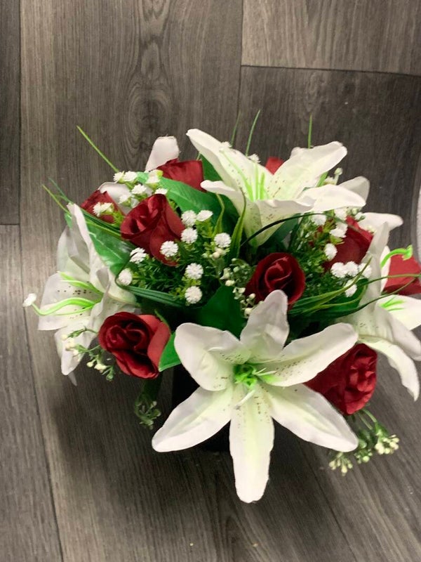 Dark red rose and ivory lily